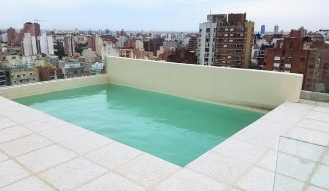 Nueva Córdoba departamento de Categoría con piscina y asadores